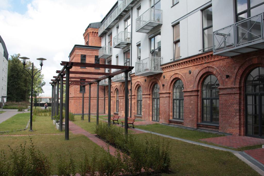 Апартаменты Loft Niezapominajka W Tobaco Park Лодзь Номер фото